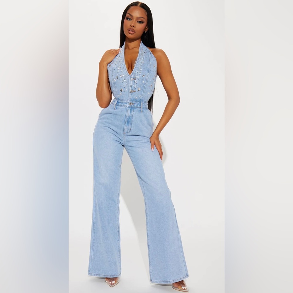 Never worn, brand new bedazzled denim jumpsuit! Comfy and fits true to size.